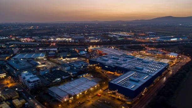 Large suburban industrial and business park - aerial view at dusk Large suburban industrial and business park - aerial view at dusk aerial view business park stock pictures, royalty-free photos & imag